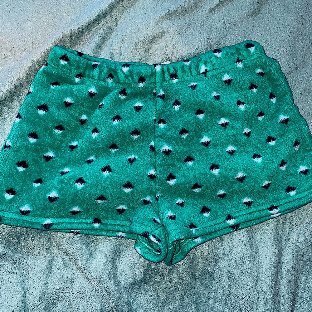 Short, soft pajama shorts, green with little black and white specks everywhere